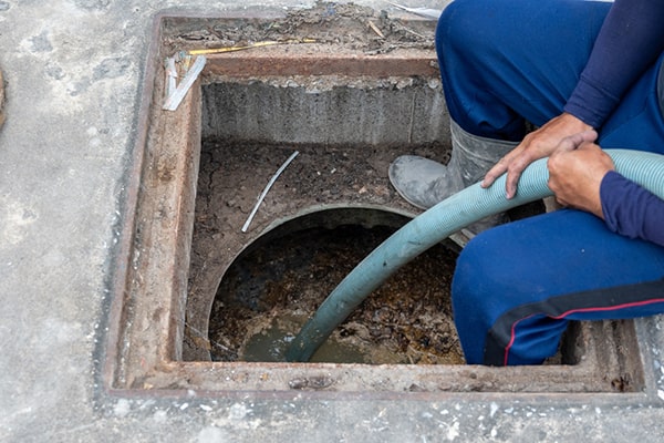 foul odors, slow draining sinks, and visible grease or food particles in the wastewater are all indicators that a grease trap needs pumping